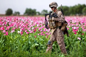 U.S. Marine Corps Cpl. Mark Hickok patrols through a field during a clearing mission in Marja in Afghanistan's Helmand province on April 9, 2011. Photo By English: Cpl. John M. McCall, U.S. Marine Corps (www.defense.gov) [Public domain], via Wikimedia Commons