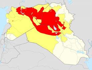 Red = Area controlled by ISIS, Yellow = Area claimed by ISIS, White = Rest of Syria and Iraq. Graphic via Wikimedia Commons