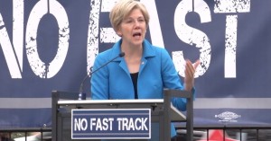 At a labor rally last week, Sen. Elizabeth Warren said workers "have to fight back" against corporate-friendly deals like TPP. "I'm proud to be with you and I’m going to be with you all the way," she said. (Image: Screengrab/AFL-CIO)