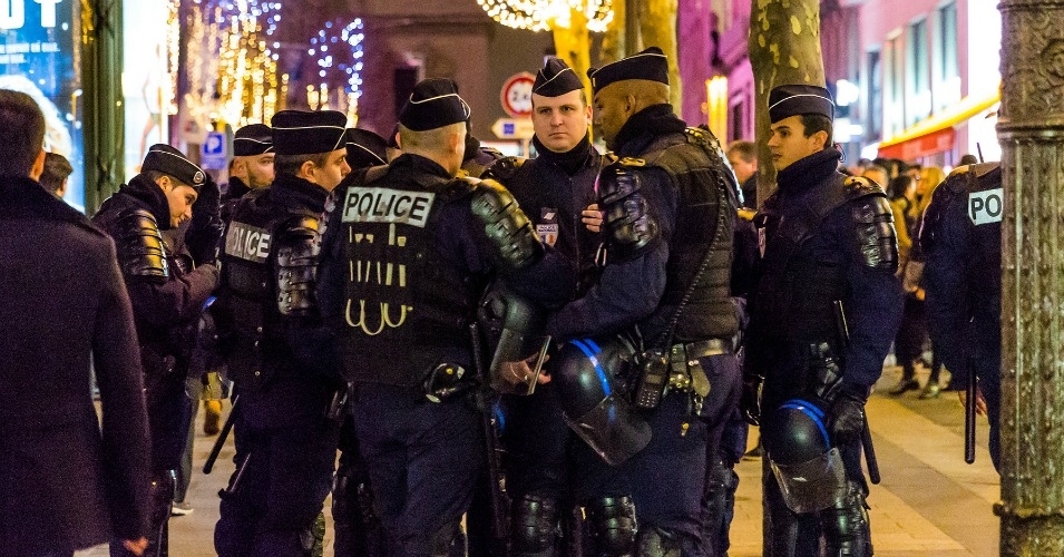 French police on the Champs-Elysees, Paris, on New Year's Eve. (Photo: ninara/flickr/cc)