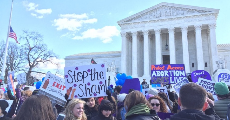 Women protest outside the U.S. Supreme Court on Wednesday against "sham" abortion laws that have threatened their health and autonomy. (Photo: NARAL Pro-choice NC/Twitter)